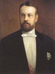 Portrait of Sergei Witte. Only his shoulders and face are pictured. He is neatly groomed and wears late nineteenth-century attire.
